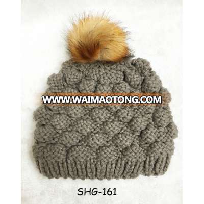 2017 Fashion new trendy unique China supplier woman men faux fur pompom crochet acrylic caps unisex chunky wholesale knitted hat